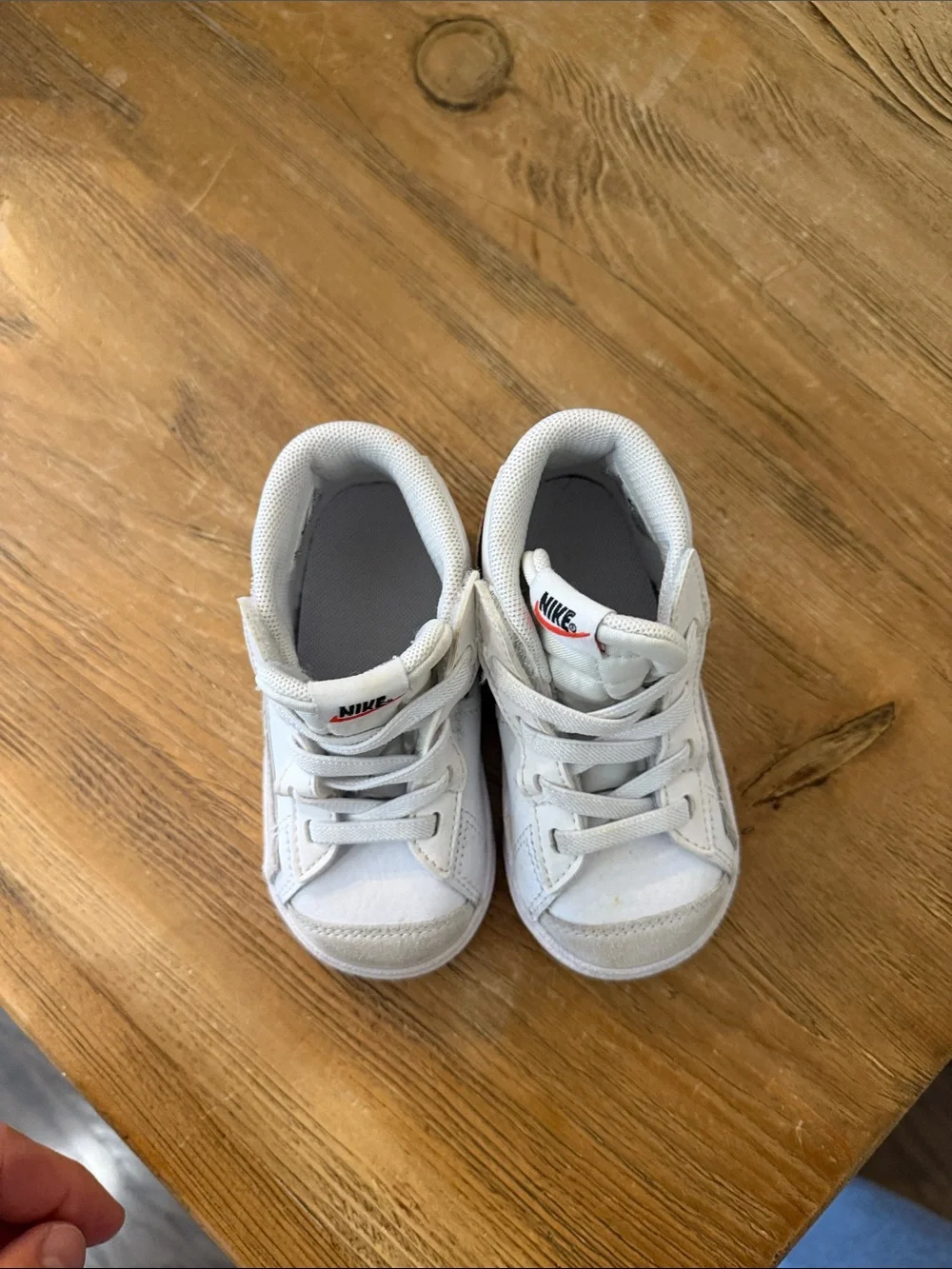 Nike Kids White and Black Mid-Top Sneakers with Red Logo Accent